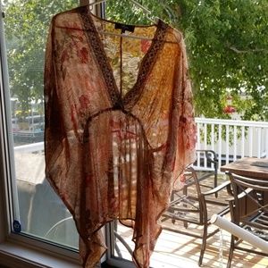 Sheer beautiful top or swimsuit cover top